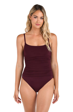 Model is wearing an Island Goddess Lingerie One Piece in Dark Cherry.