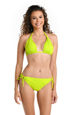 Model is wearing a multicolored Island Goddess Halter Triangle Swimsuit Top