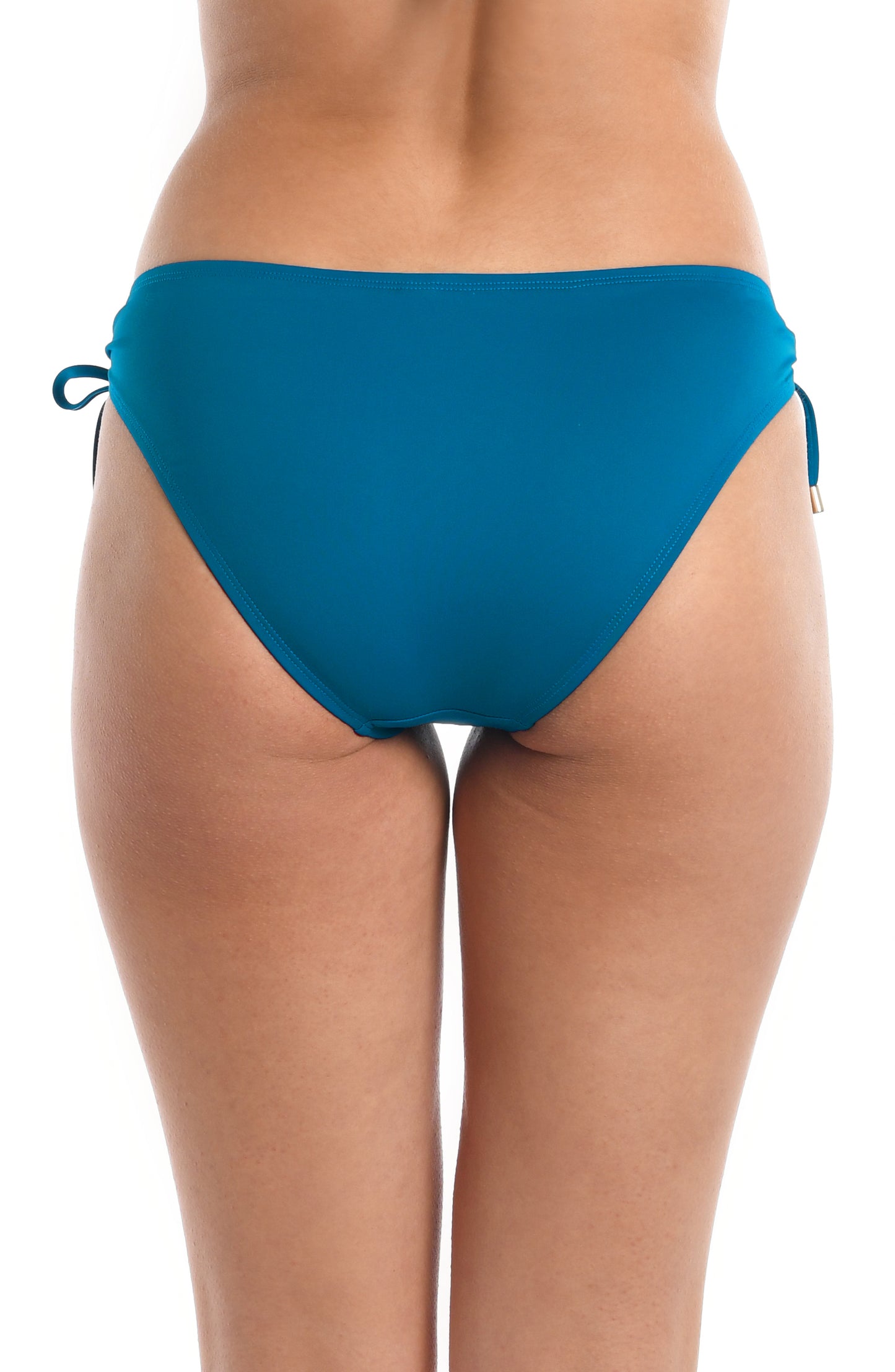 Model is wearing a ocean colored side-tie swimsuit bottom from our Best-Selling Island Goddess collection.