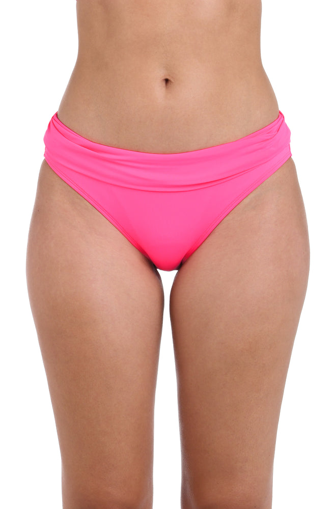 Front image of model wearing the Island Goddess Shirred Band Hipster Bottom in Bright Pink.