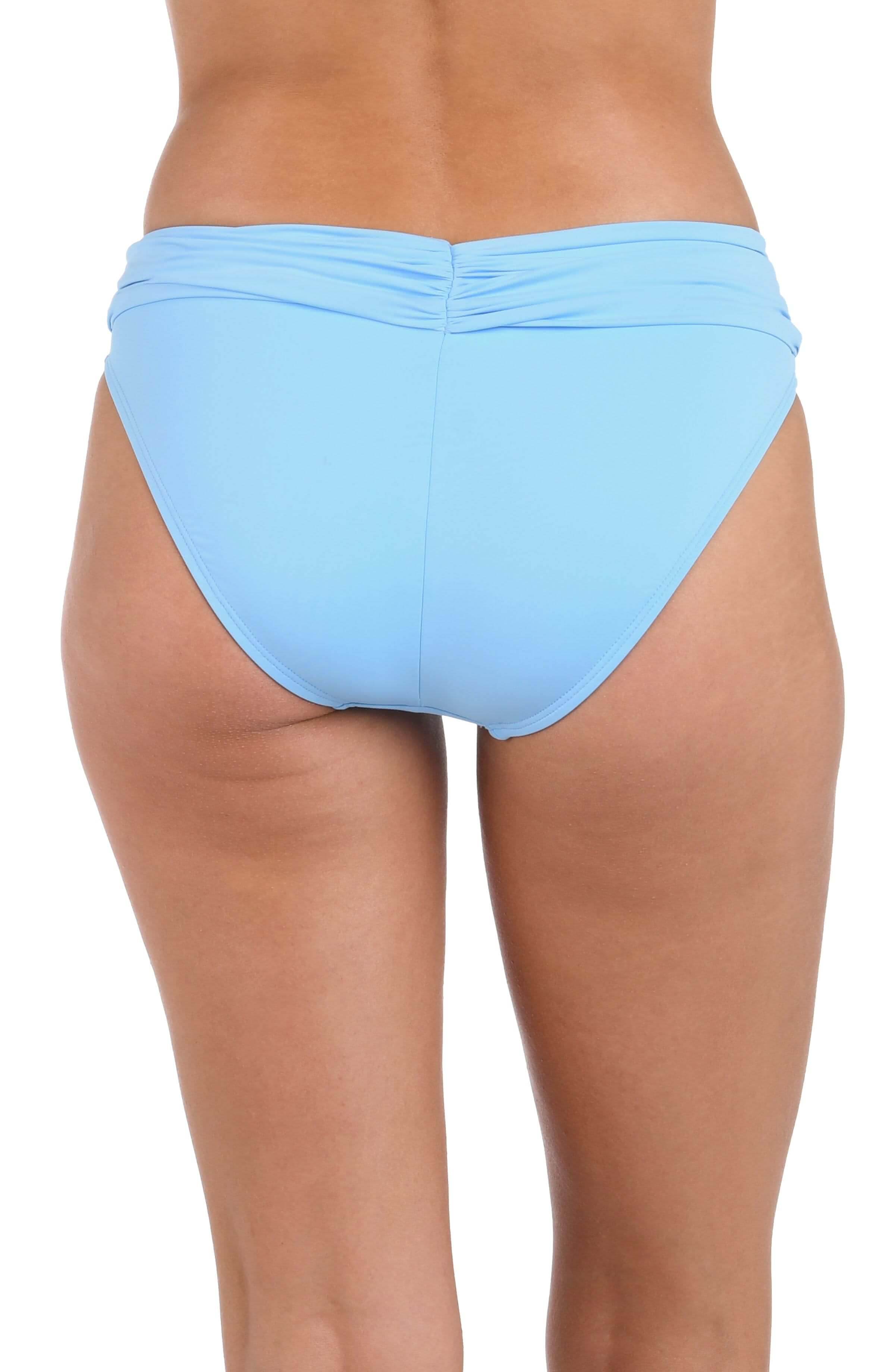 Back image of model wearing the Island Goddess Shirred Band Hipster Swimsuit Bottom in Crystal Blue.
