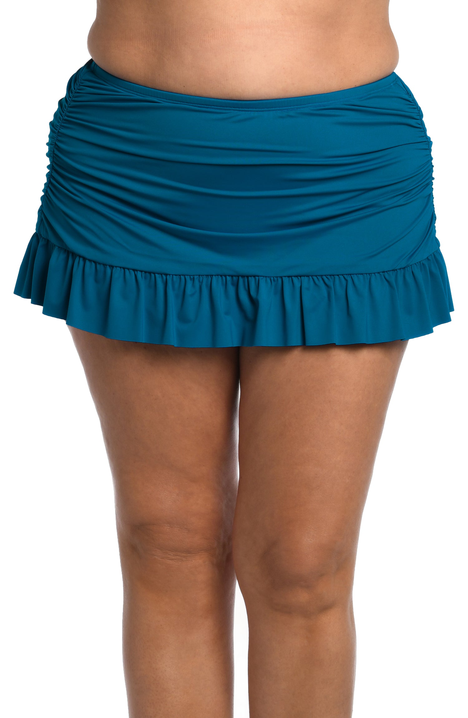 Model is wearing a ocean colored skirted hipster swimsuit bottom from our Best-Selling Island Goddess collection.