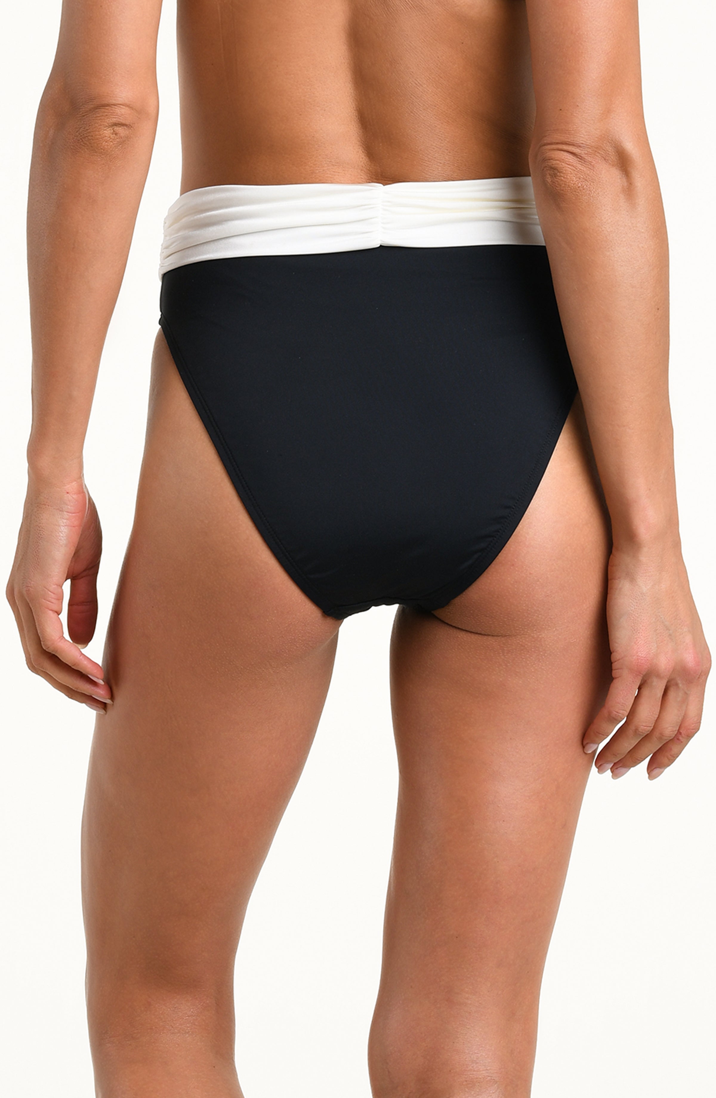Rear view of a model wearing high-waisted black bikini bottoms with a contrasting white ruched waistband, set against a plain white background.