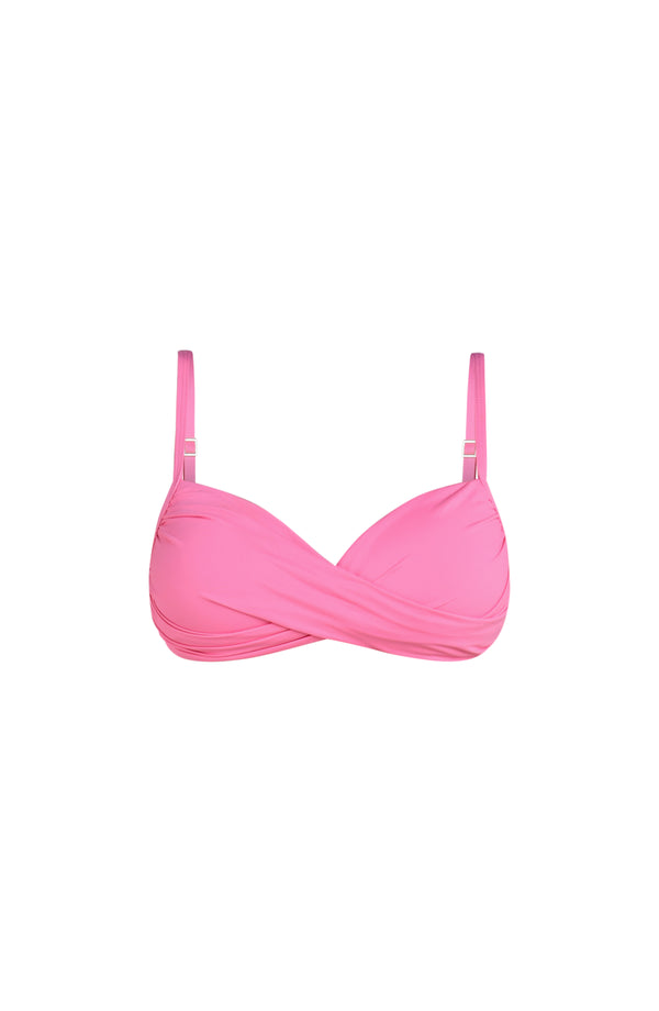 Floating image of a rose pink colored bikini top with adjustable thin straps and a wrap-style front.