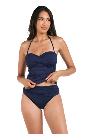 Model is wearing an Island Goddess Bandeau Tankini Top in Indigo.