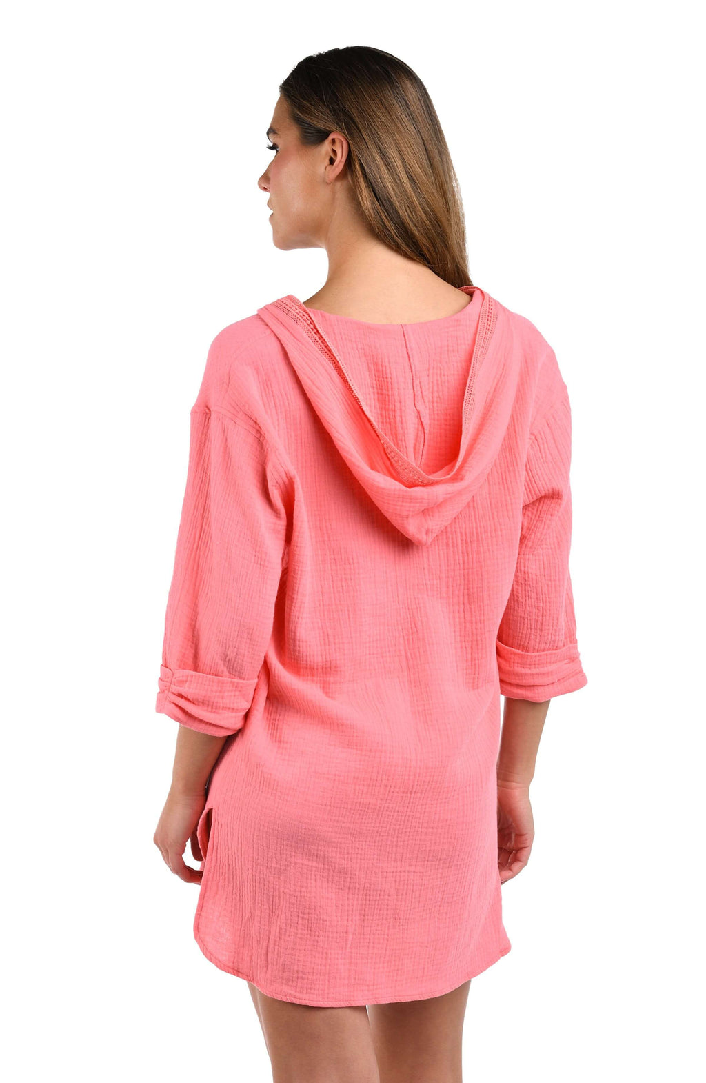 Back image of model wearing the Seaside Covers Hoodie in Light Coral
