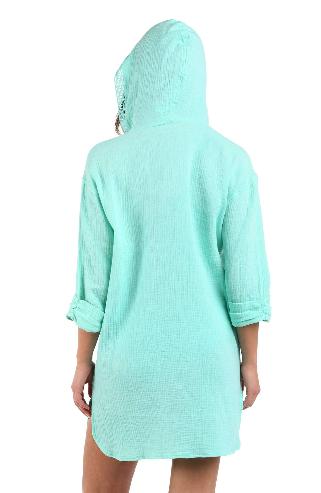 Back image of model wearing the Seaside Covers Hoodie in Seabreeze