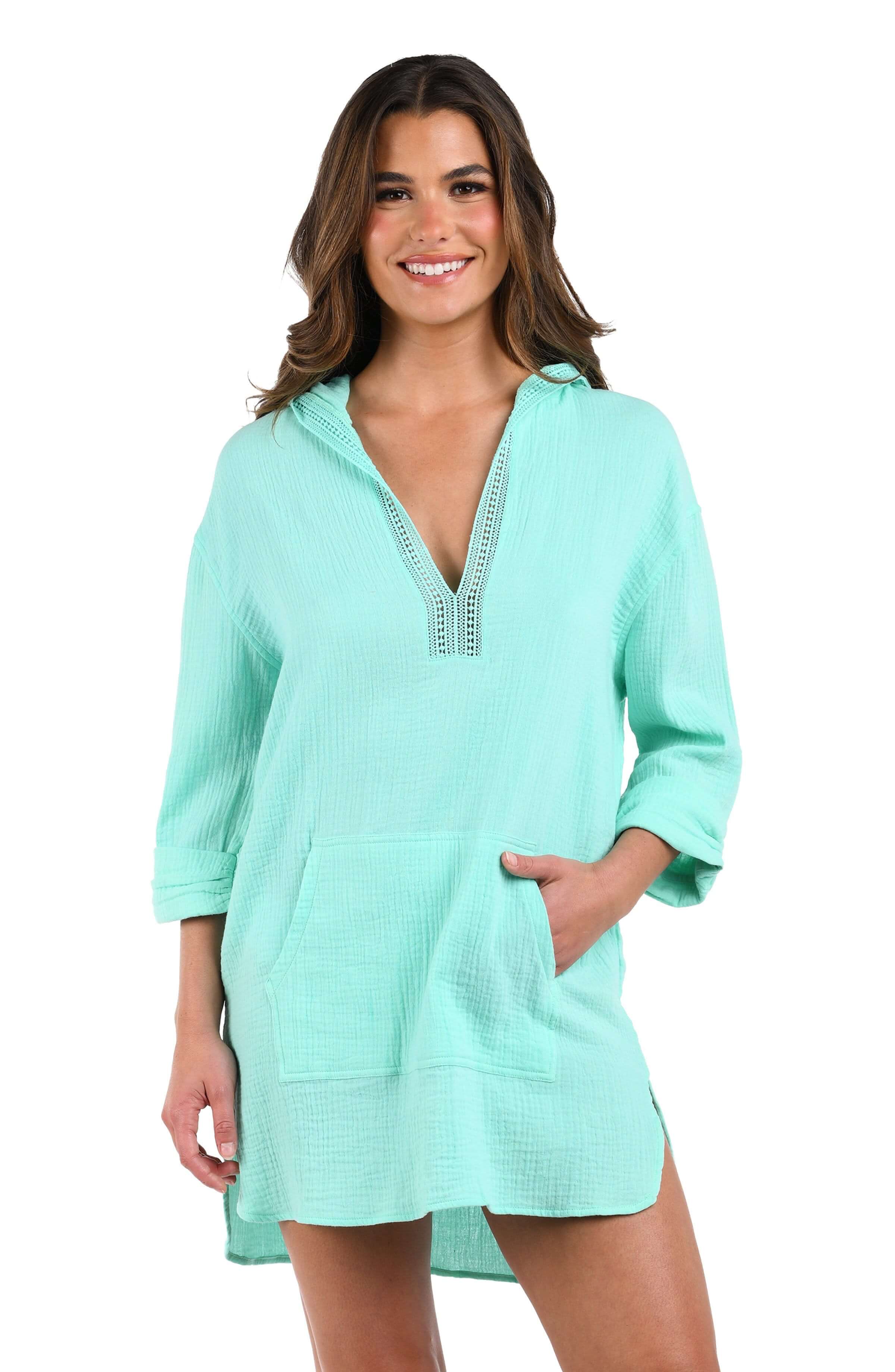 Front image of model wearing the Seaside Covers Hoodie in Seabreeze
