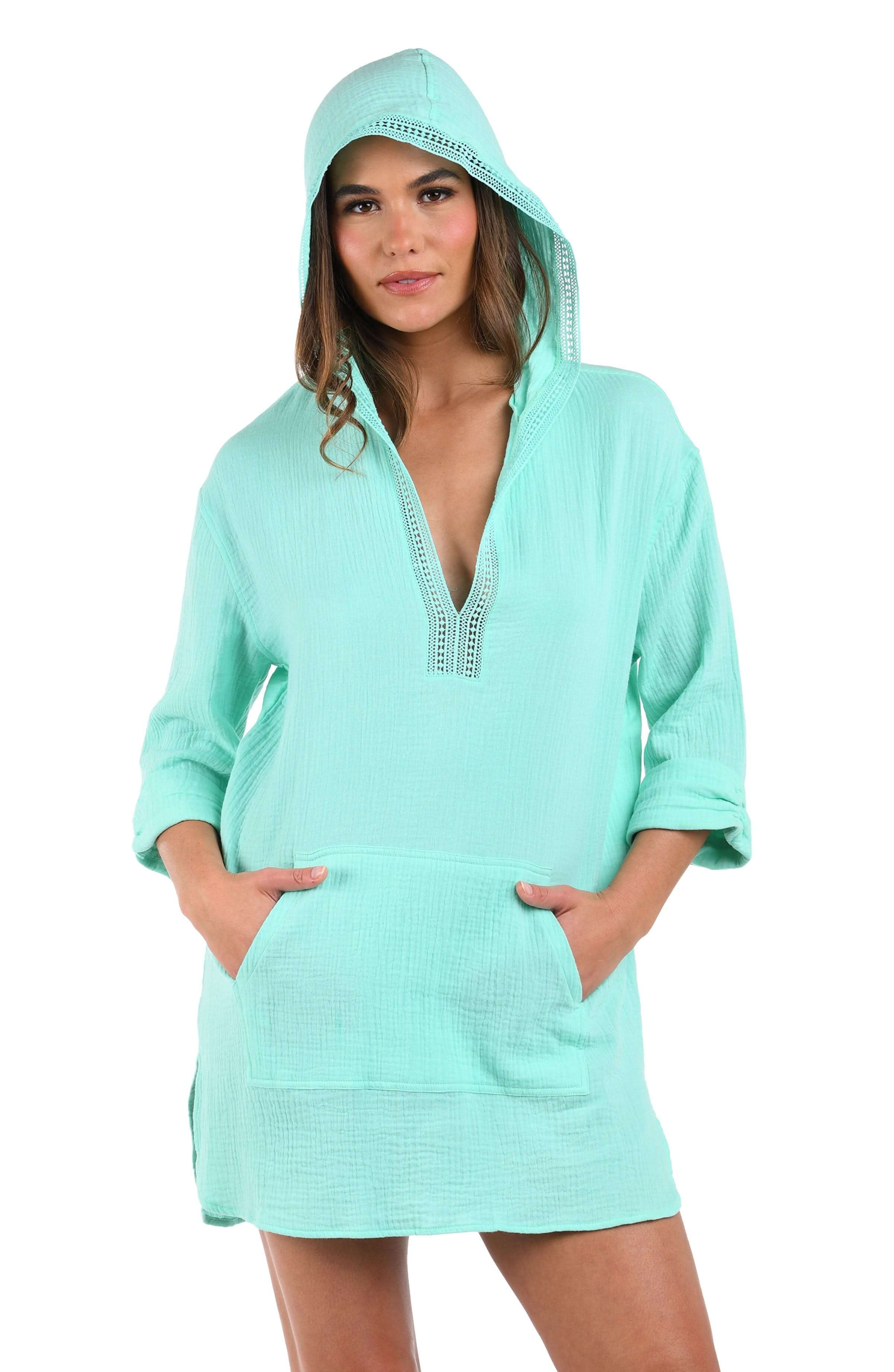 Front image of model wearing the Seaside Covers Hoodie in Seabreeze