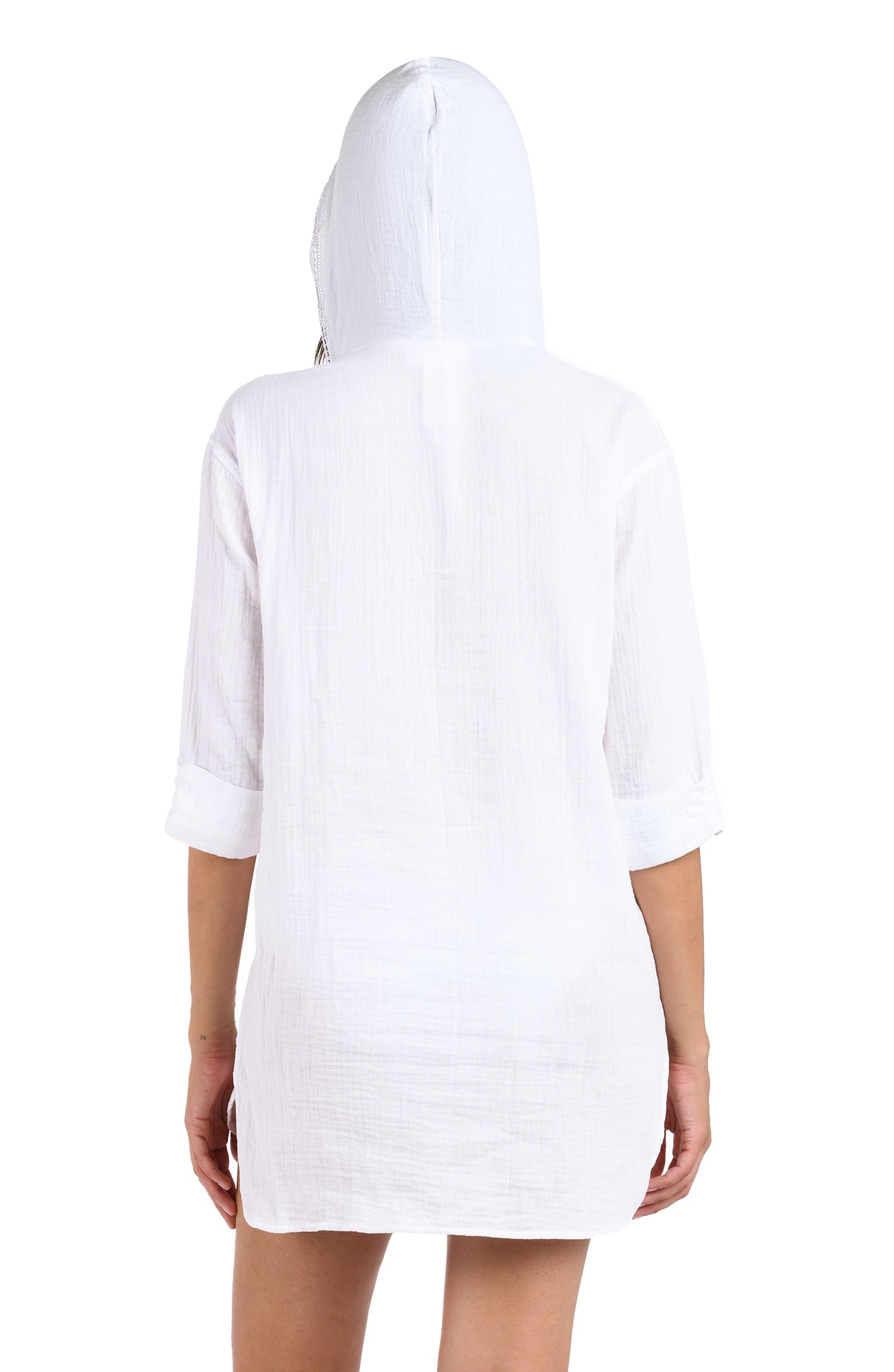 Model is wearing a white hooded cover up from our Seaside Covers collection!