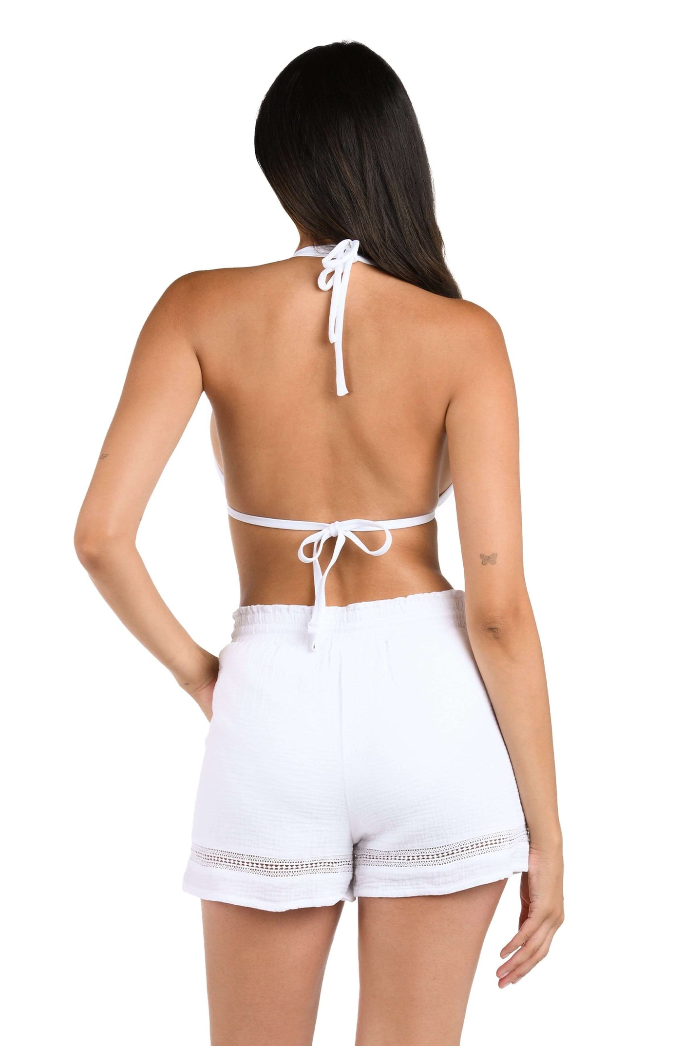 
                  
                    Model is wearing solid white beach shorts from our Seaside Covers collection.
                  
                