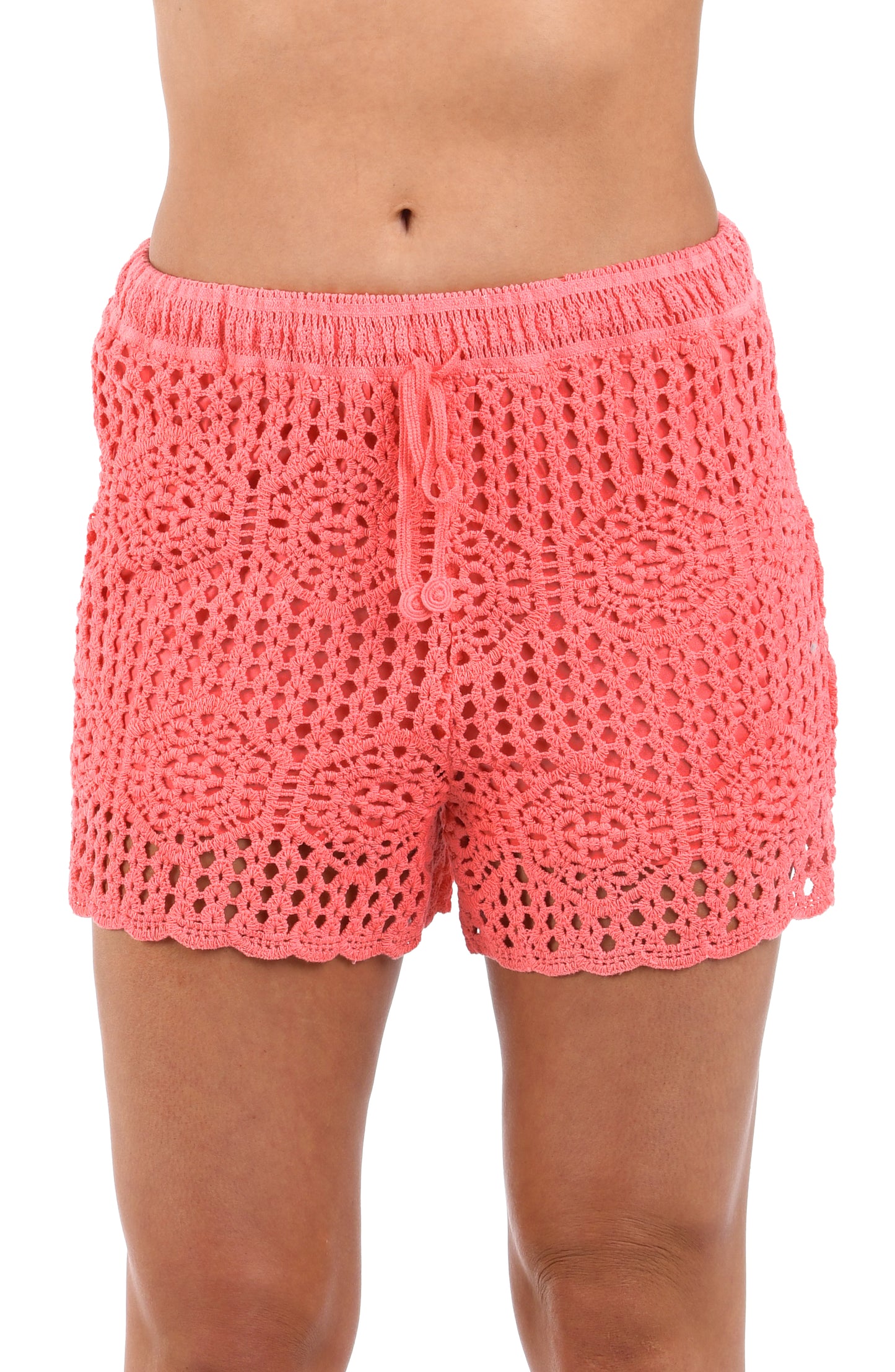 Front image of model wearing the Waverly Covers Crochet Beach Shorts in Coral Reef.