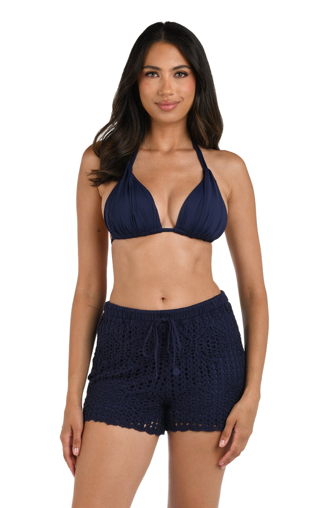 Model is wearing an indigo Beach Short Swimsuit Cover Up