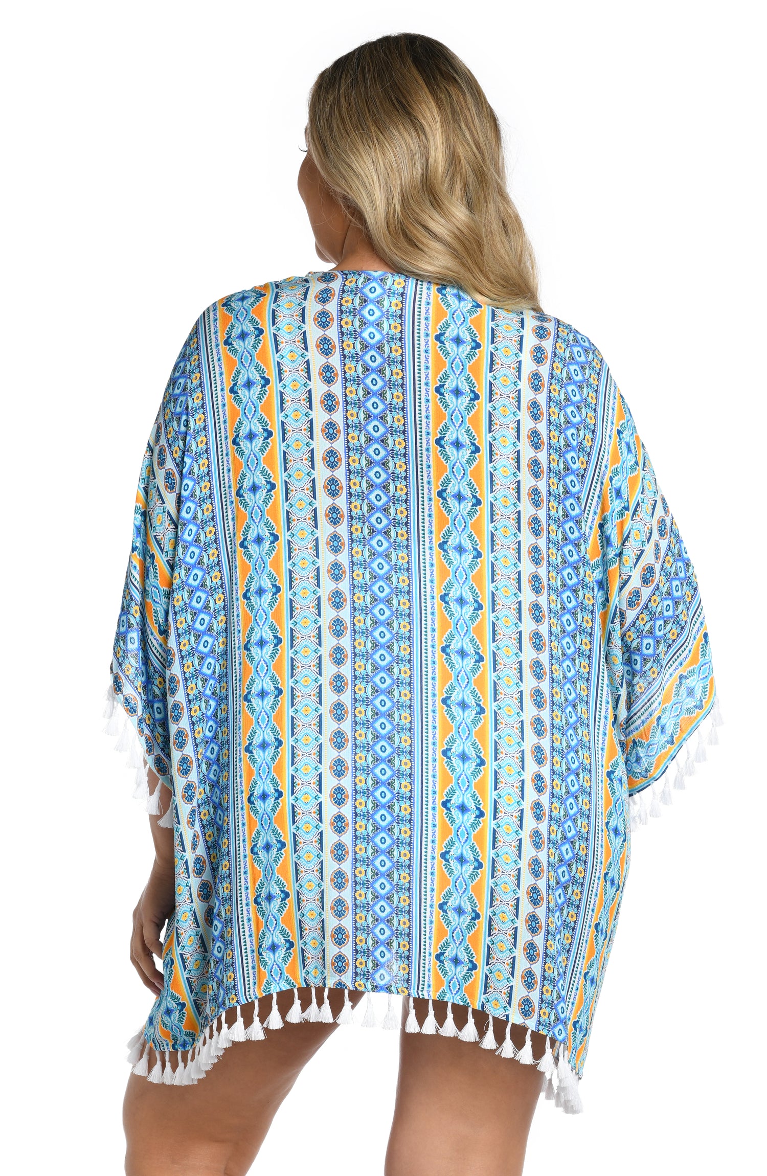 Model is wearing a blue multicolored mediterranean printed open front kimono cover up from our Scarf City collection.