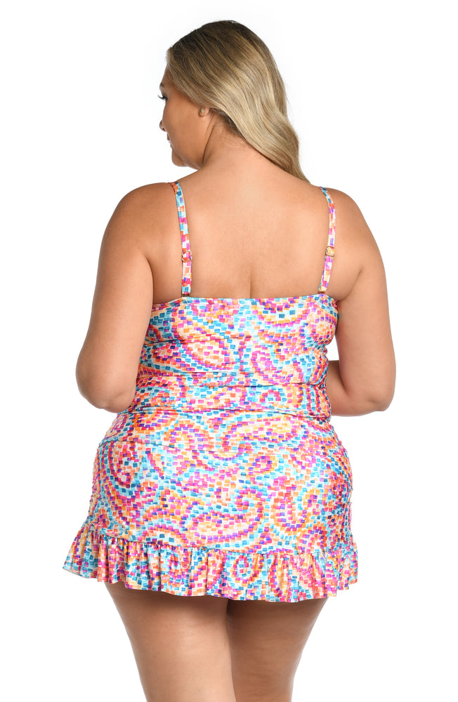 
            
                Load image into Gallery viewer, Model is wearing a pink multicolored paisley printed bandeau tankini top from our Pebble Beach collection.
            
        