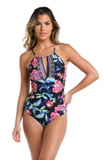 Model is wearing a black, pink, and blue multicolored floral patterned  High-Neck Keyhole One Piece