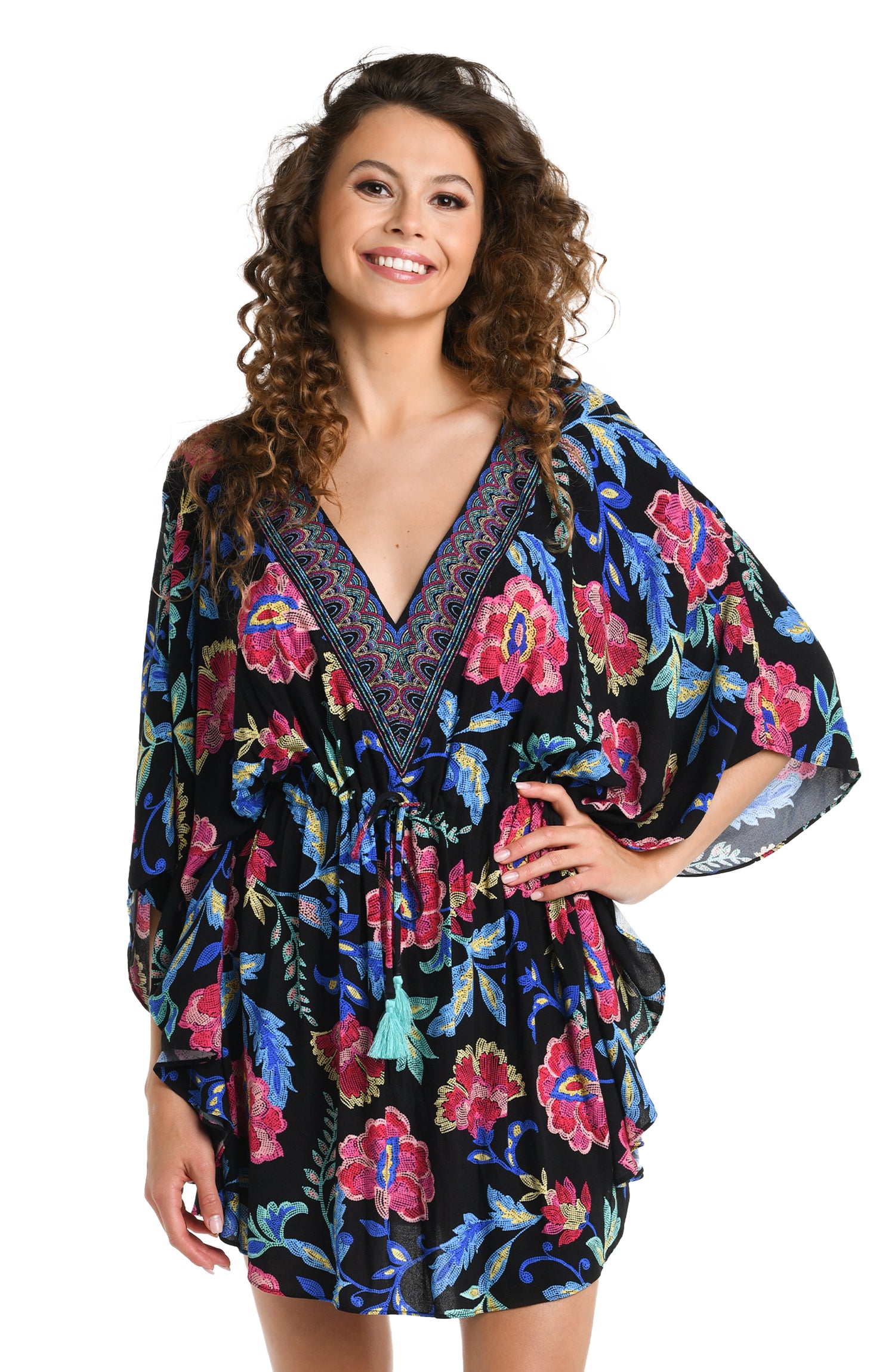 Model is wearing a black, pink, and blue multicolored floral patterned  V-Neck Caftan Cover Up