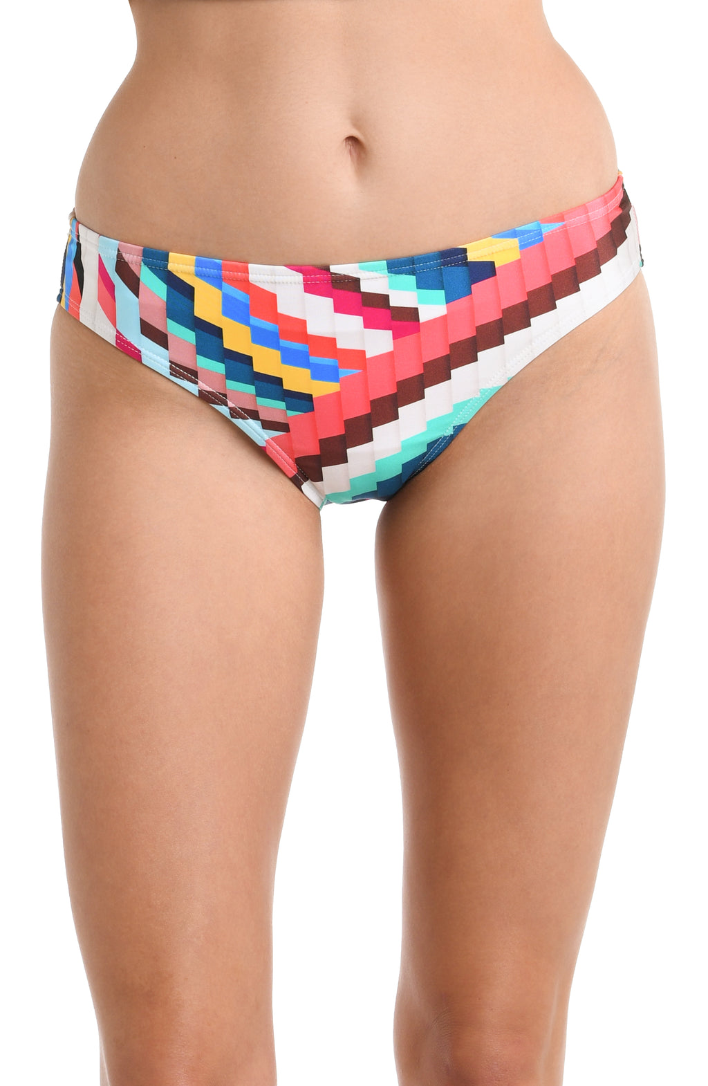 Close-up front image of model wearing a vibrant multi-colored geometric printed swimsuit bottom featuring a hipster cut. 