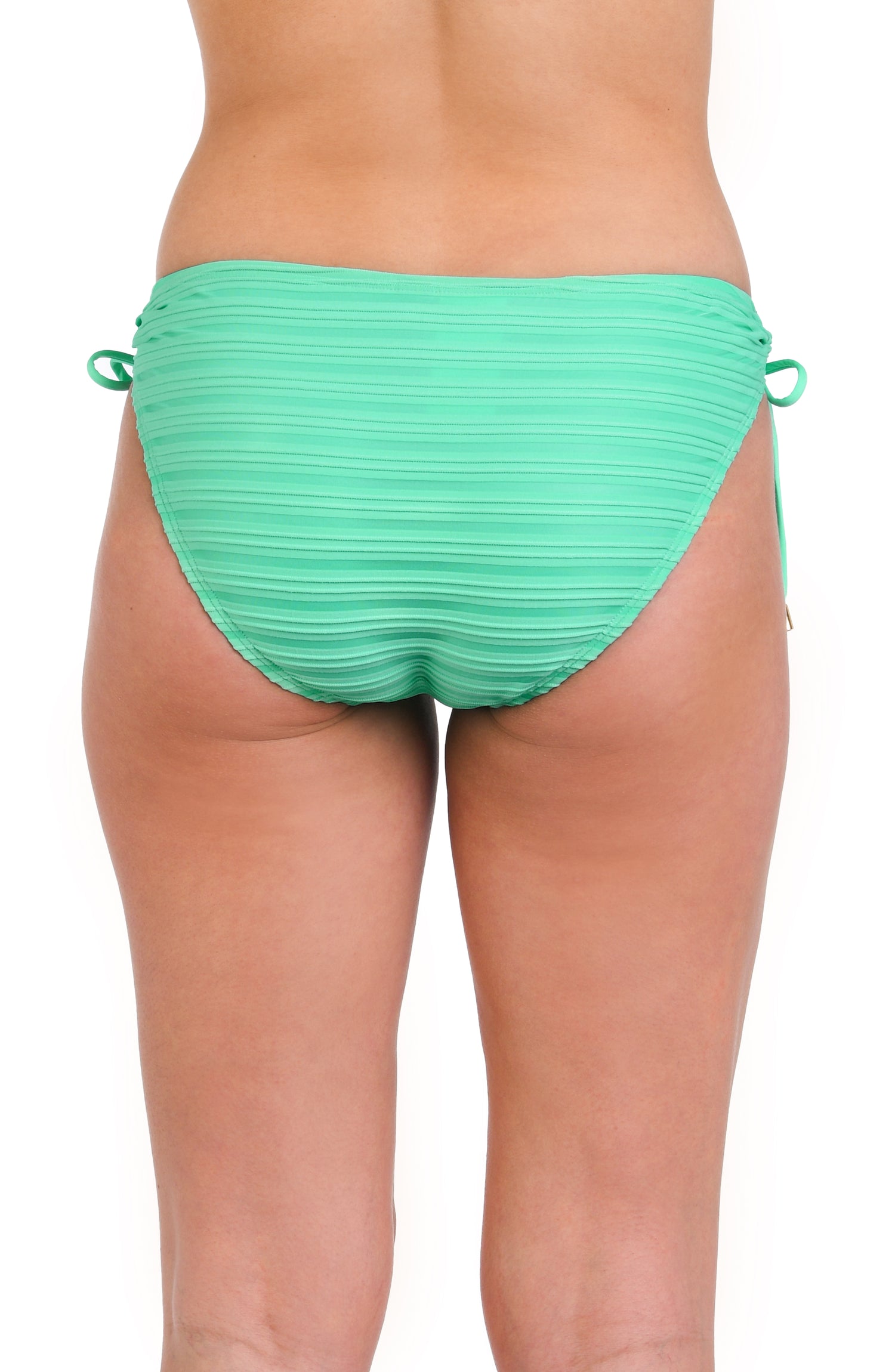 Model is wearing a textured seafoam green colored side tie hipster bikini bottom with clean textured horizontal lines.