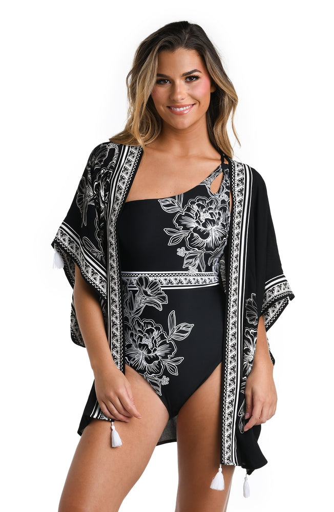 Model is wearing a multicolored Kimono Swimsuit Cover Up