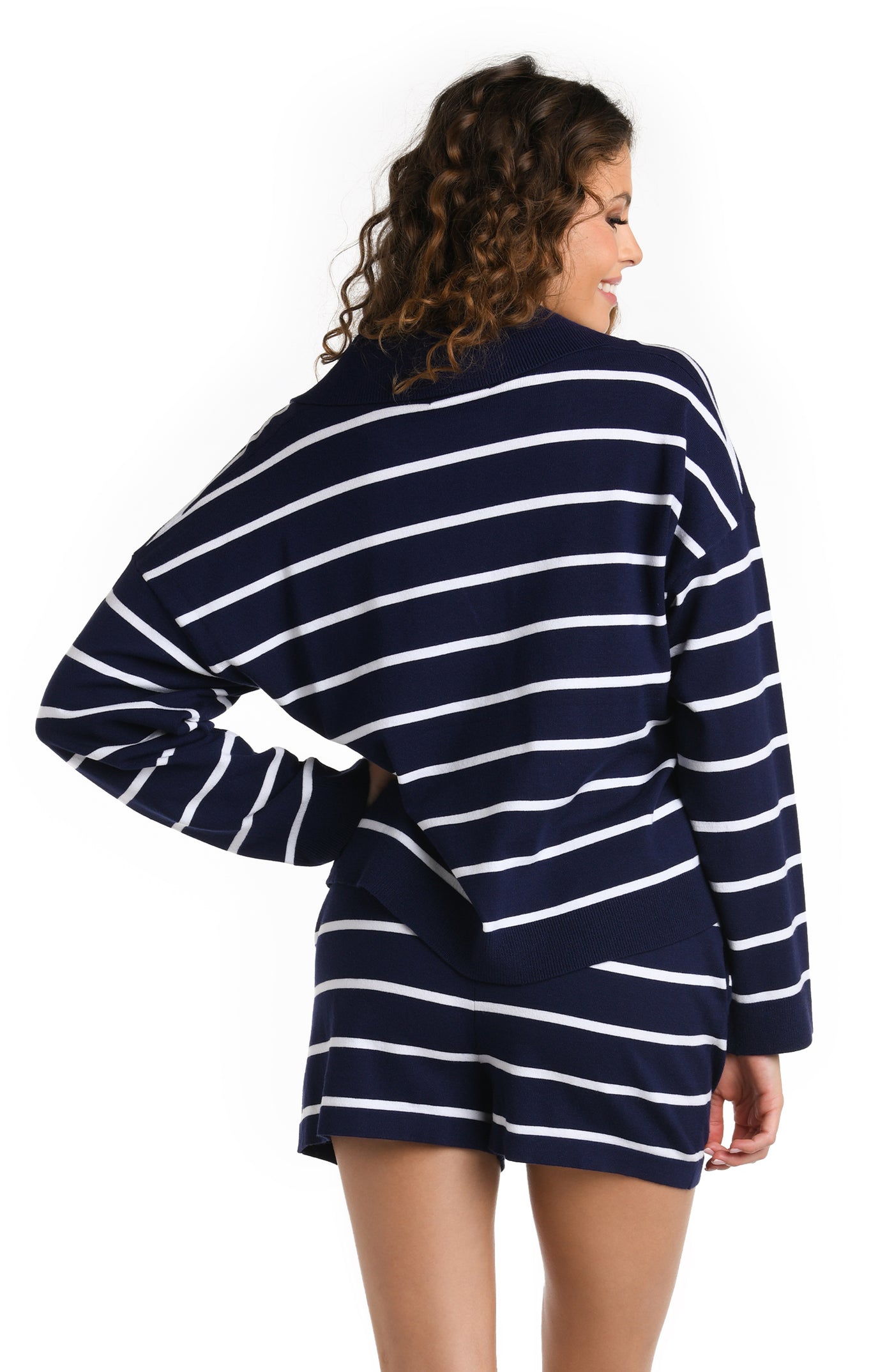 
                  
                    Model is wearing a multicolored Collared Sweater Cover Up
                  
                