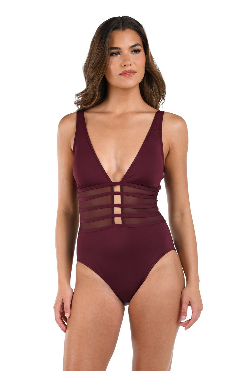 Front image of model wearing the Island Goddess Over the Shoulder Mesh One Piece in Dark Cherry.