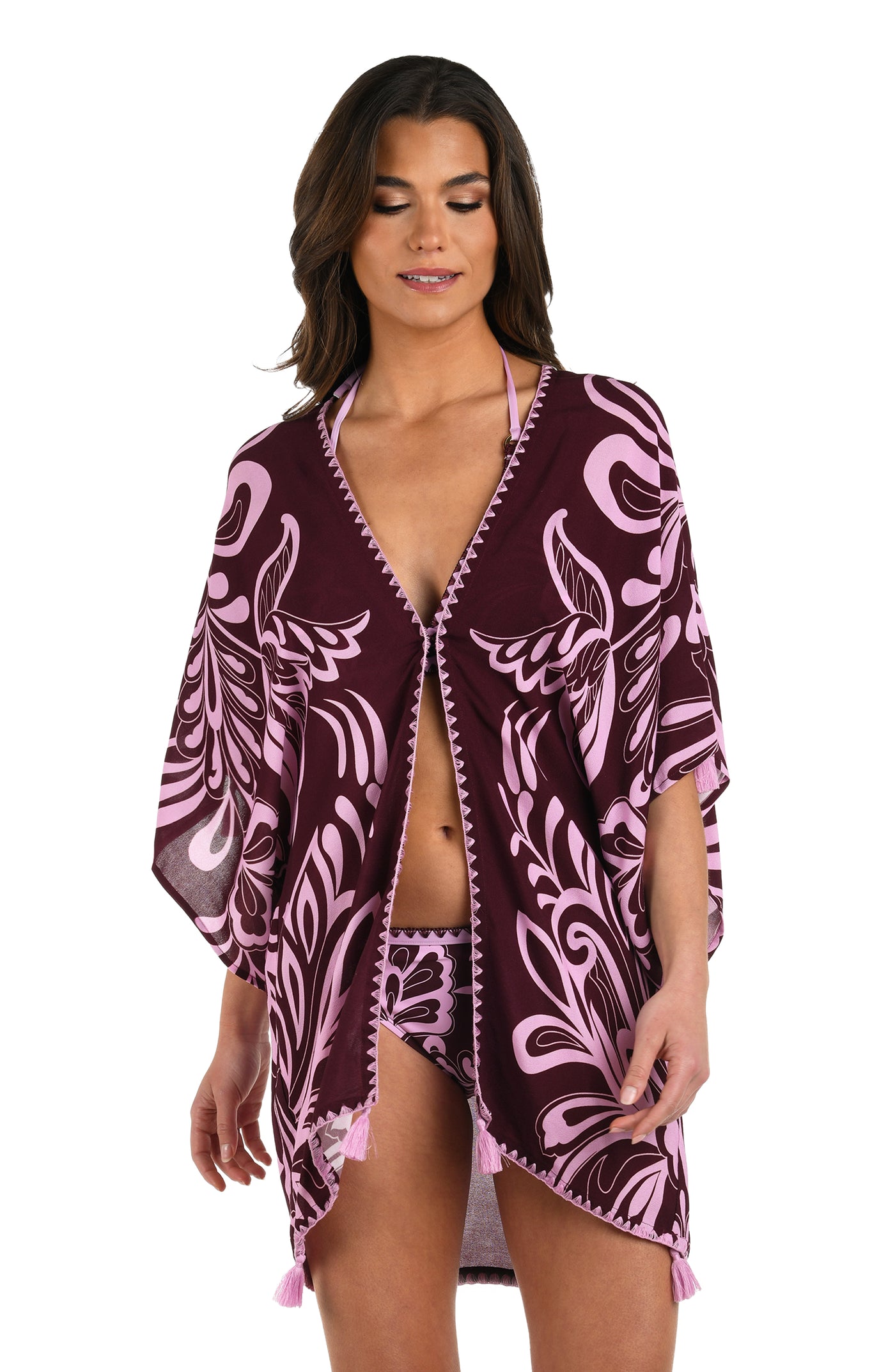 
                  
                    Front image of model wearing a dark cherry and pink tropical patterned open front kimono cover up that is closed with a hook & eye closure. 
                  
                