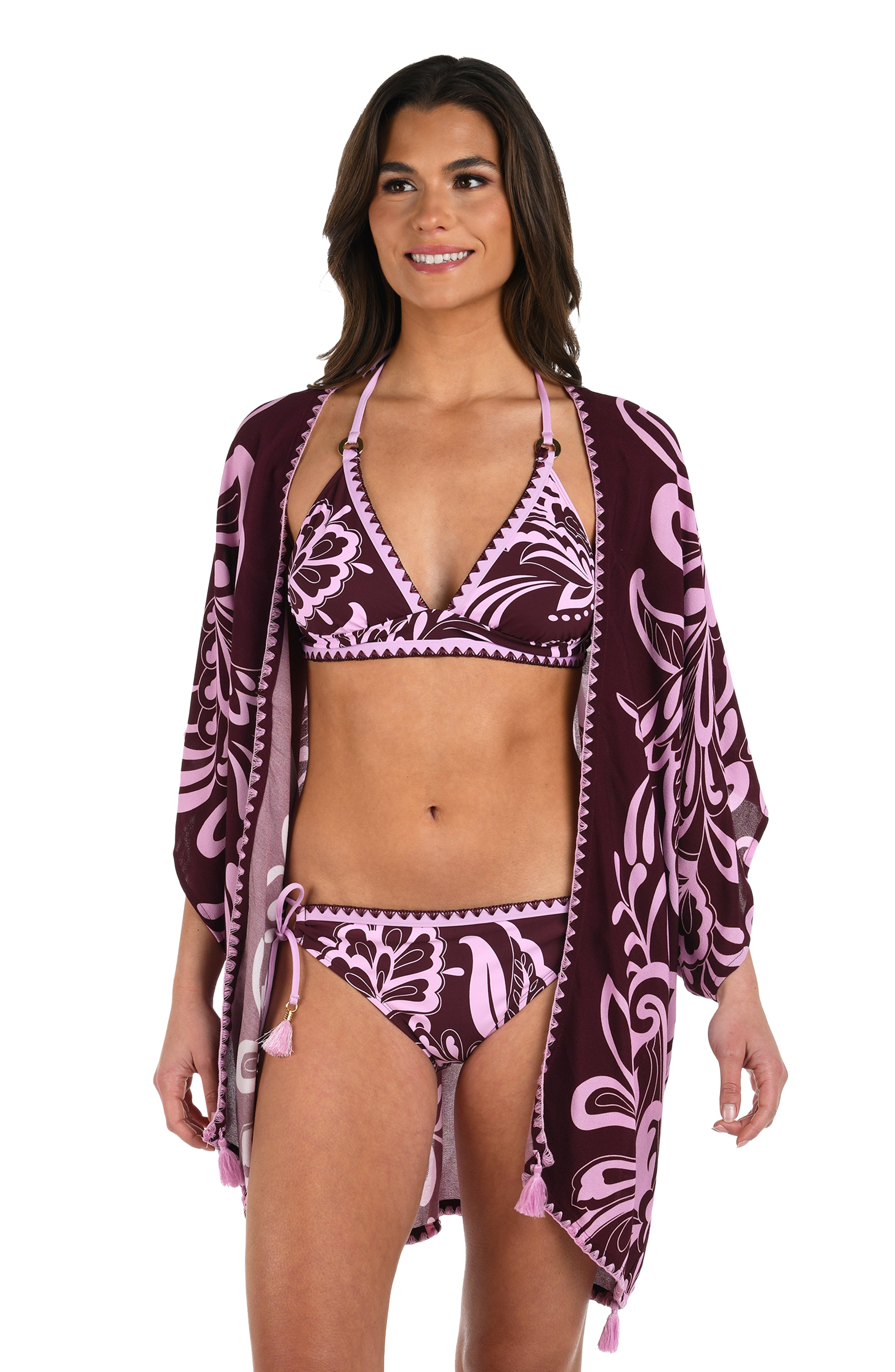 Front image of model wearing a dark cherry and pink tropical patterned open front kimono cover up. 