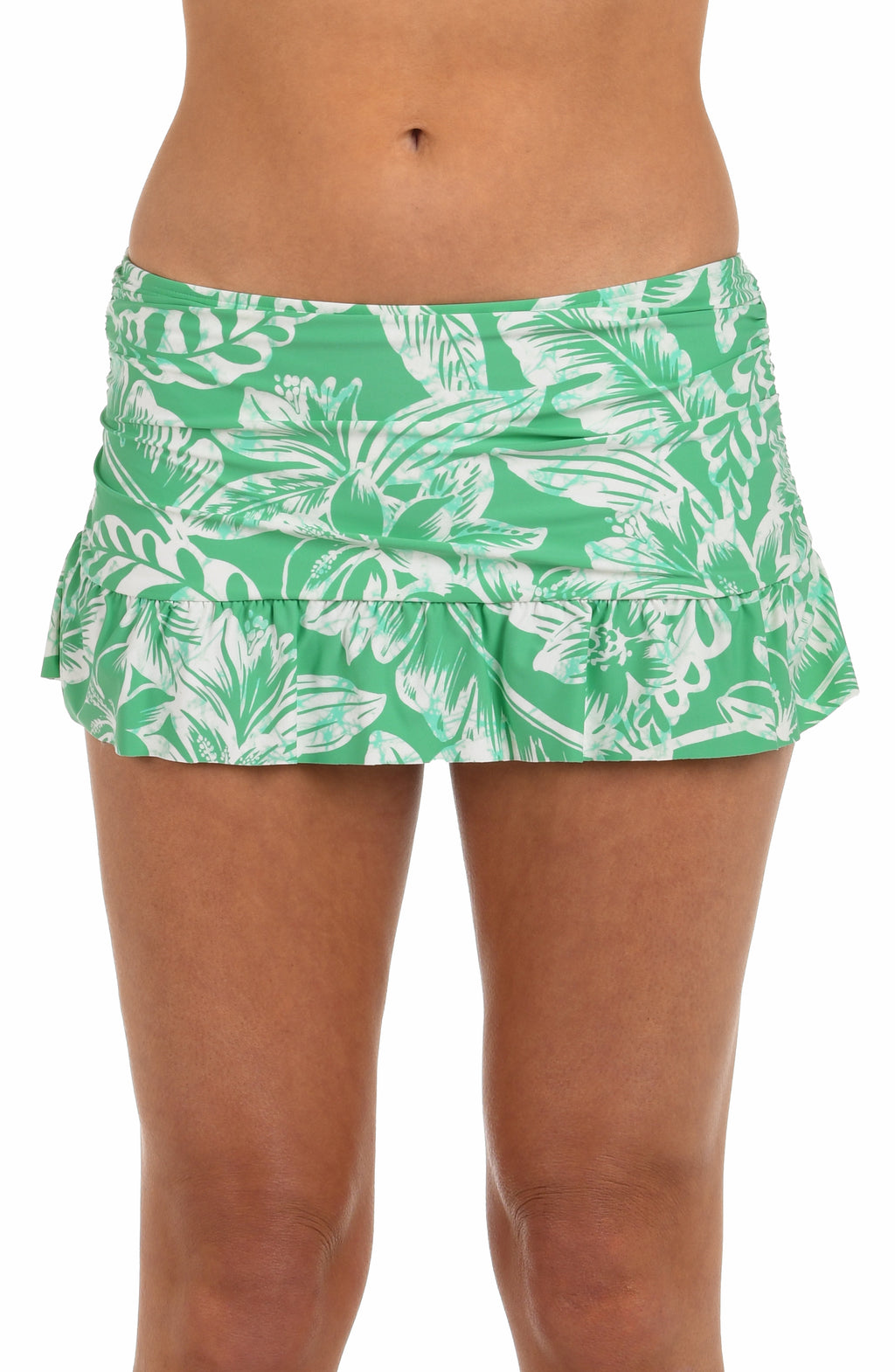 Front image of model wearing a green and white floral-printed ruffle skirted bottom featuring a built-in brief and a shirred body. 