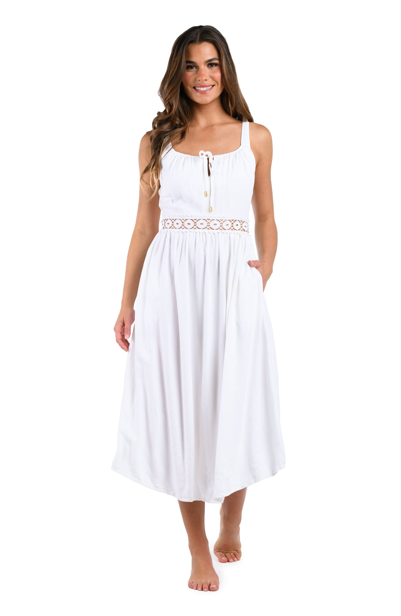 Front image of model wearing the Lakeside Linen Tunnel Neck Midi Dress in white.