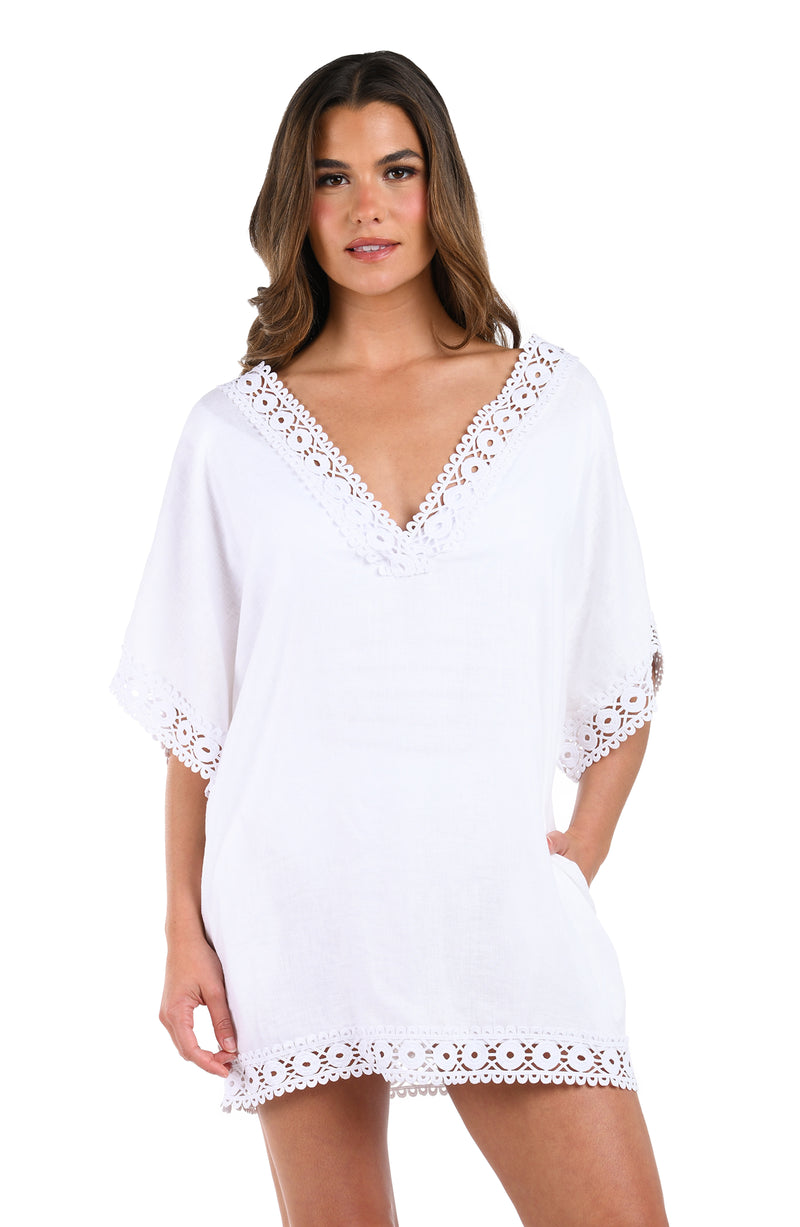 Front image of model wearing the Lakeside Linen Short Sleeve Tunic in white.