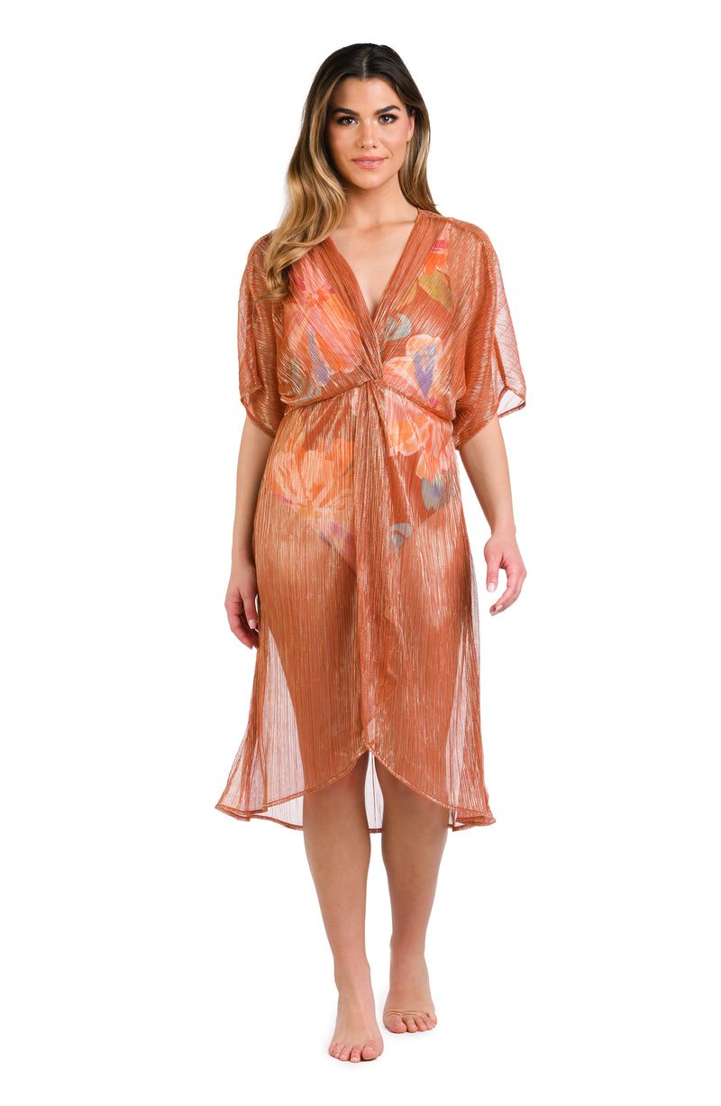 Model is wearing a shimmering copper short sleeve midi dress cover up.