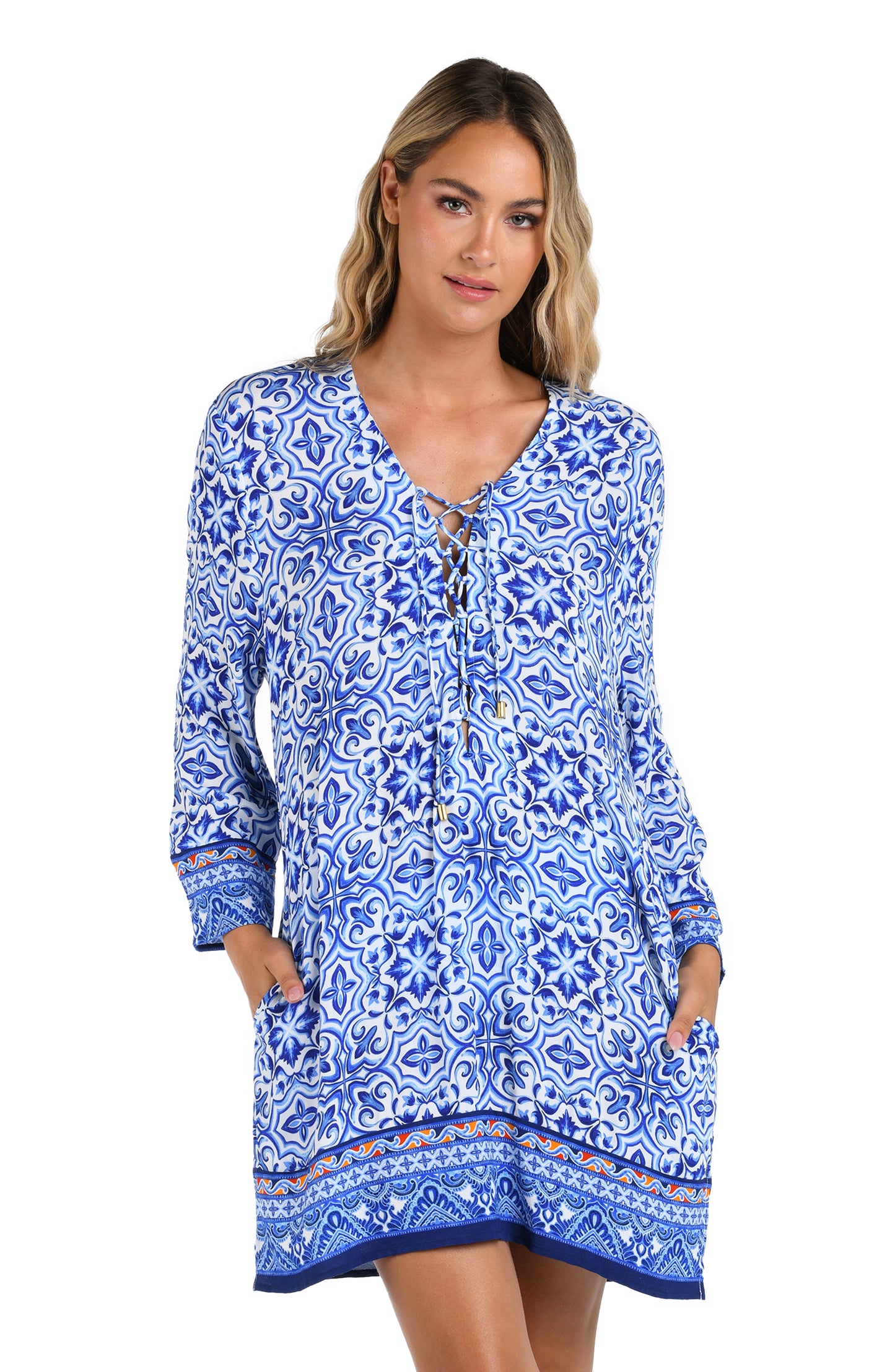 Front image of model wearing the Alboran Sea Lace Up V-Neck Tunic Cover Up.