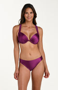 Front image of model wearing basic hipster bikini bottoms in a berry color. 