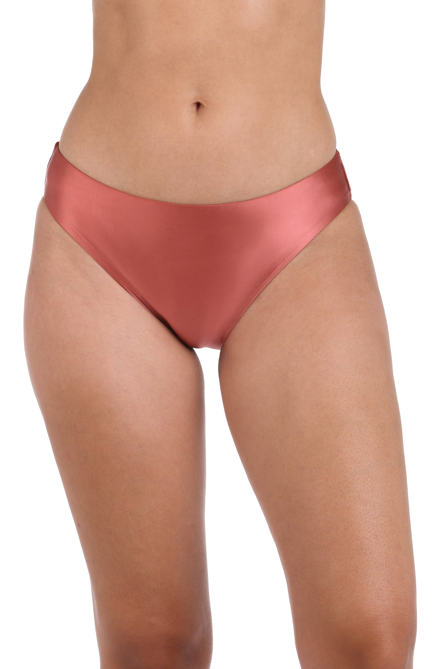 This is a front image of a model  wearing a sienna colored hipster swimsuit bottom from the Earth Goddess swim collection.