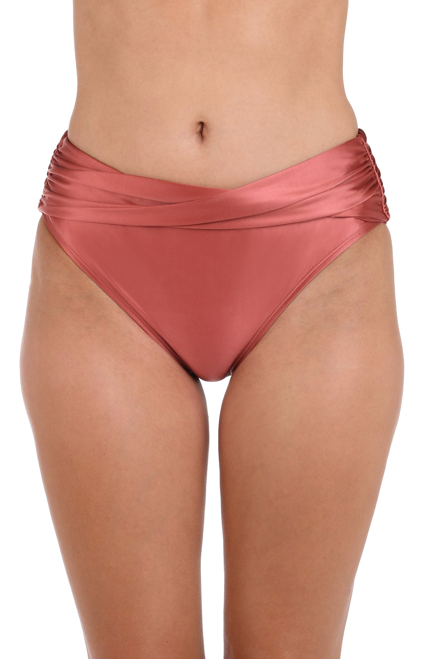 
                  
                    This is the front image of a model wearing a sienna colored twist front high-waisted swimsuit bottom from the Earth Goddess swim collection.
                  
                
