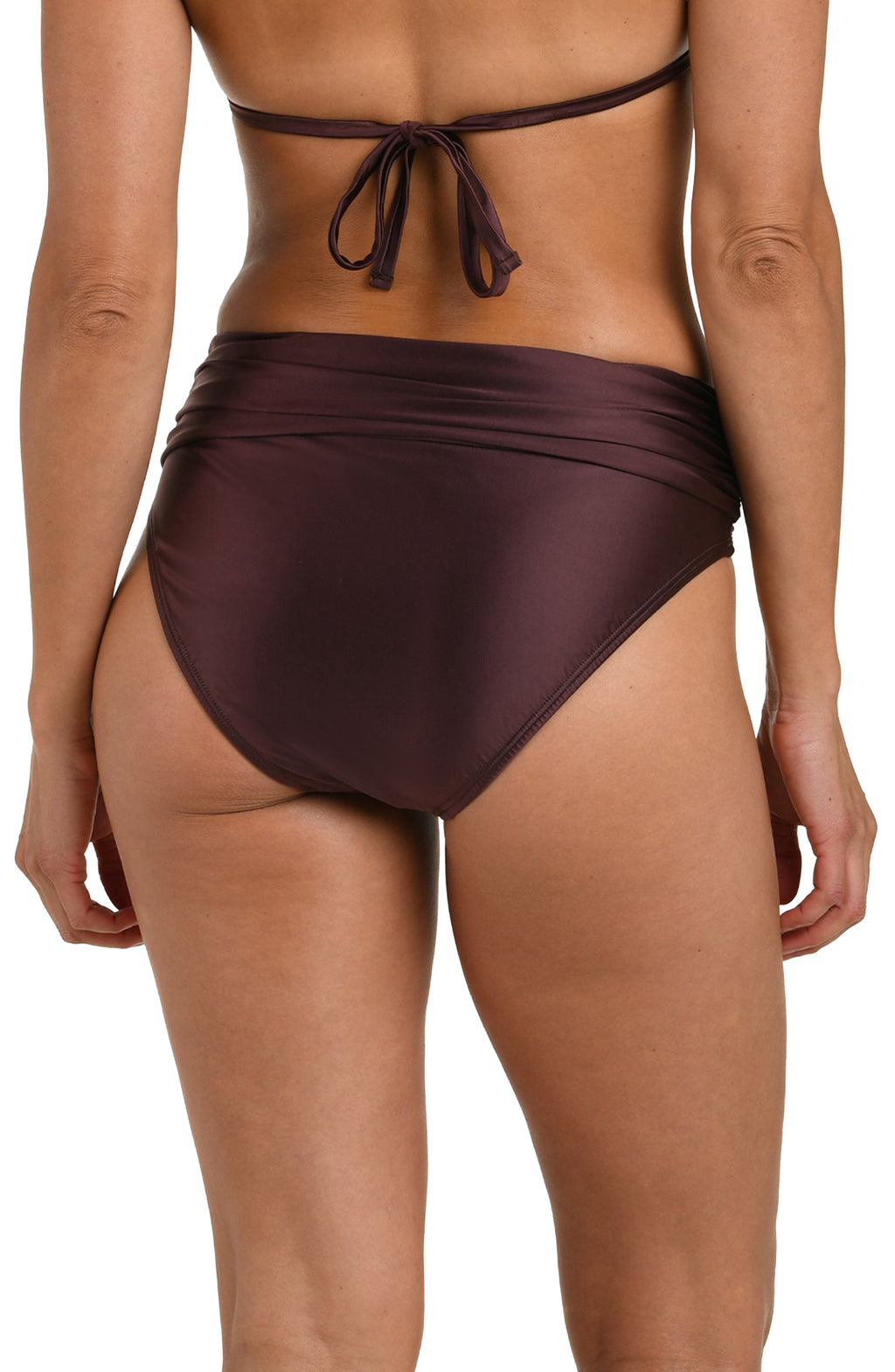 Back image of model wearing a truffle (brown) colored bikini bottom with a mid-rise fit, banded, and moderate rear coverage.