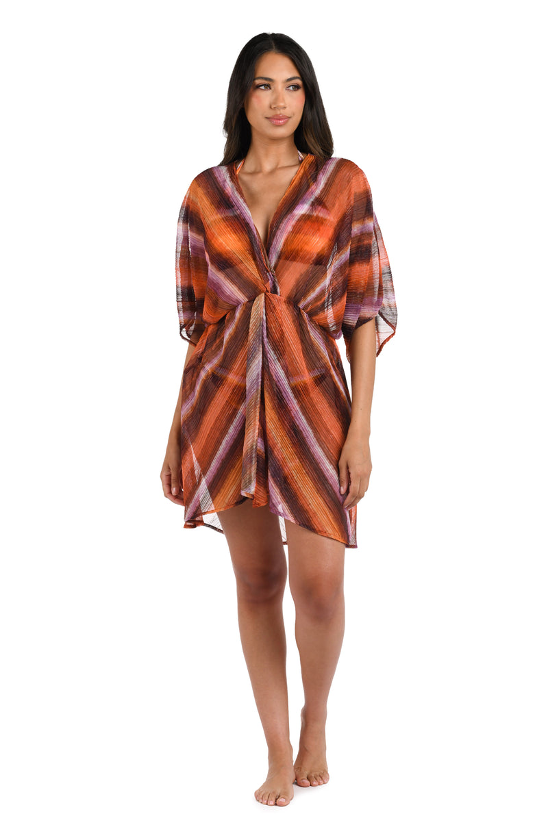 Model is wearing an Upon the Horizon V-Neck Cover Up Dress.