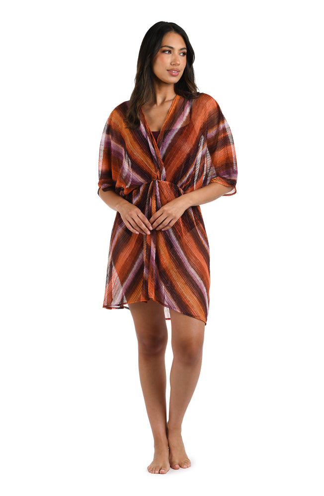 Model is wearing an Upon the Horizon V-Neck Cover Up Dress.