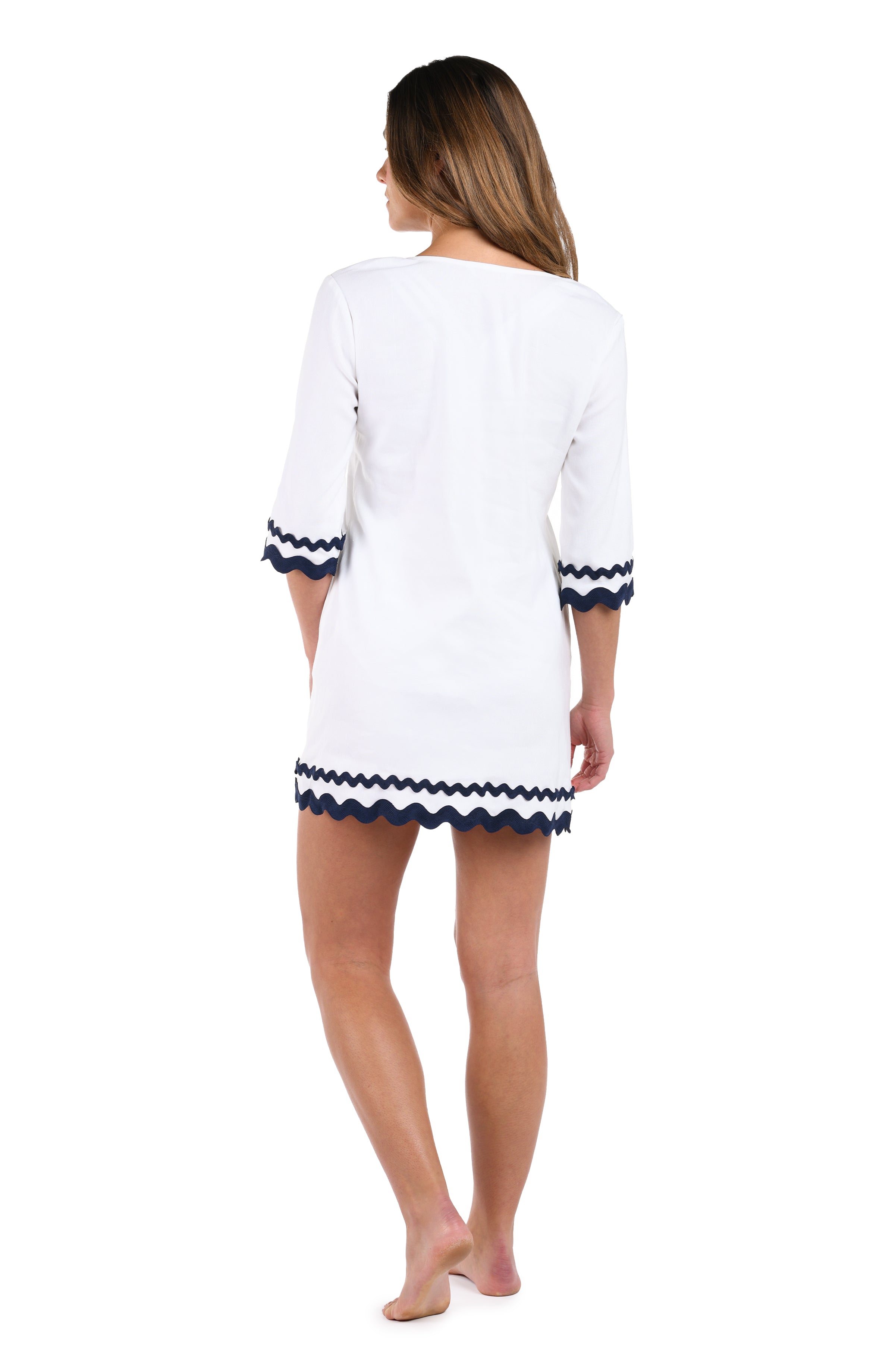 Back image of model wearing the Poolside Chic V-Neck Tunic in white and indigo.