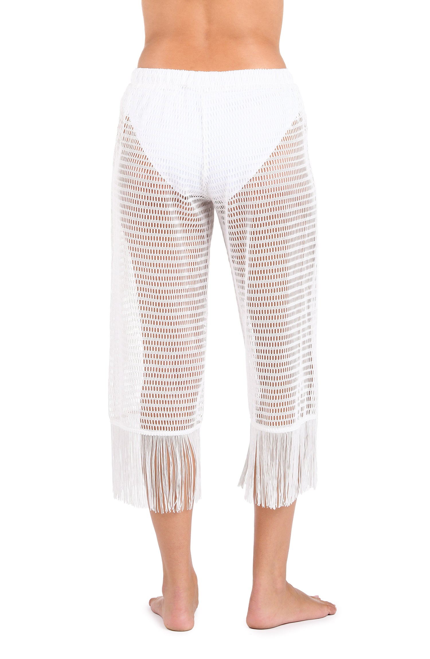 Model is wearing a Fringed Out Cropped Pant in White.