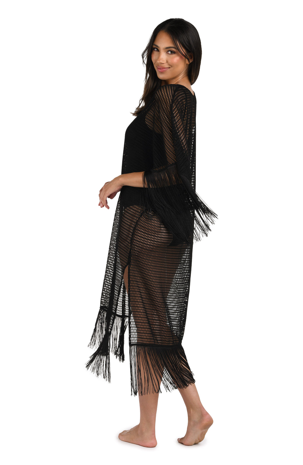 Model is wearing a Fringed Out Long Caftan Cover Up in Black.