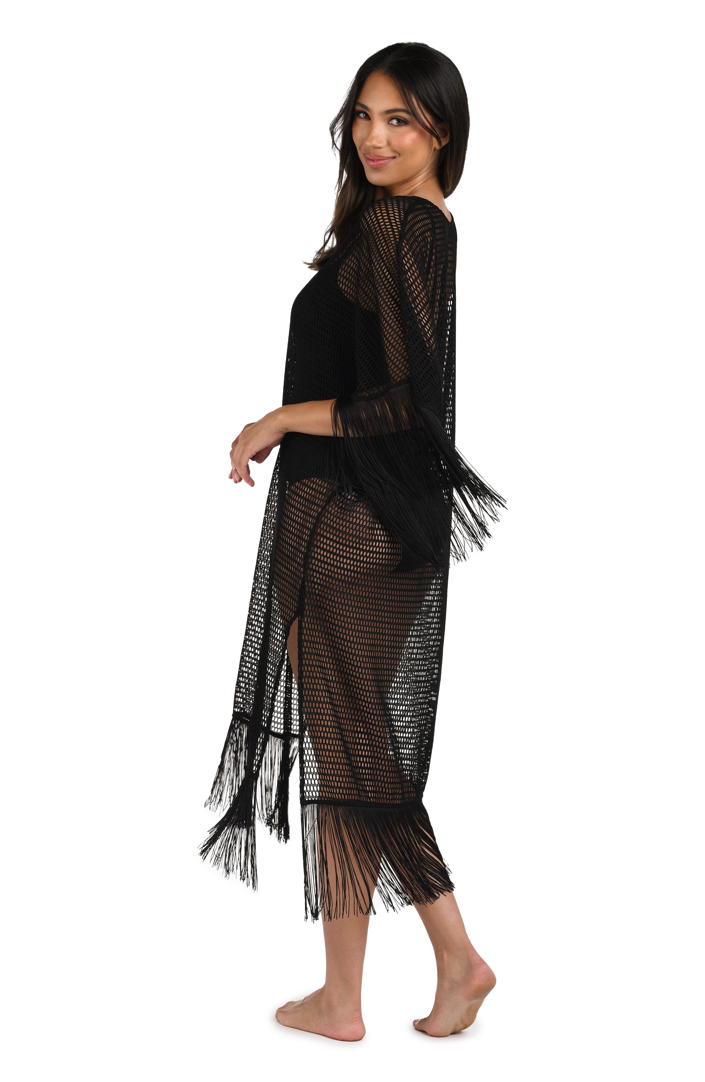 Model is wearing a Fringed Out Long Caftan Cover Up in Black.