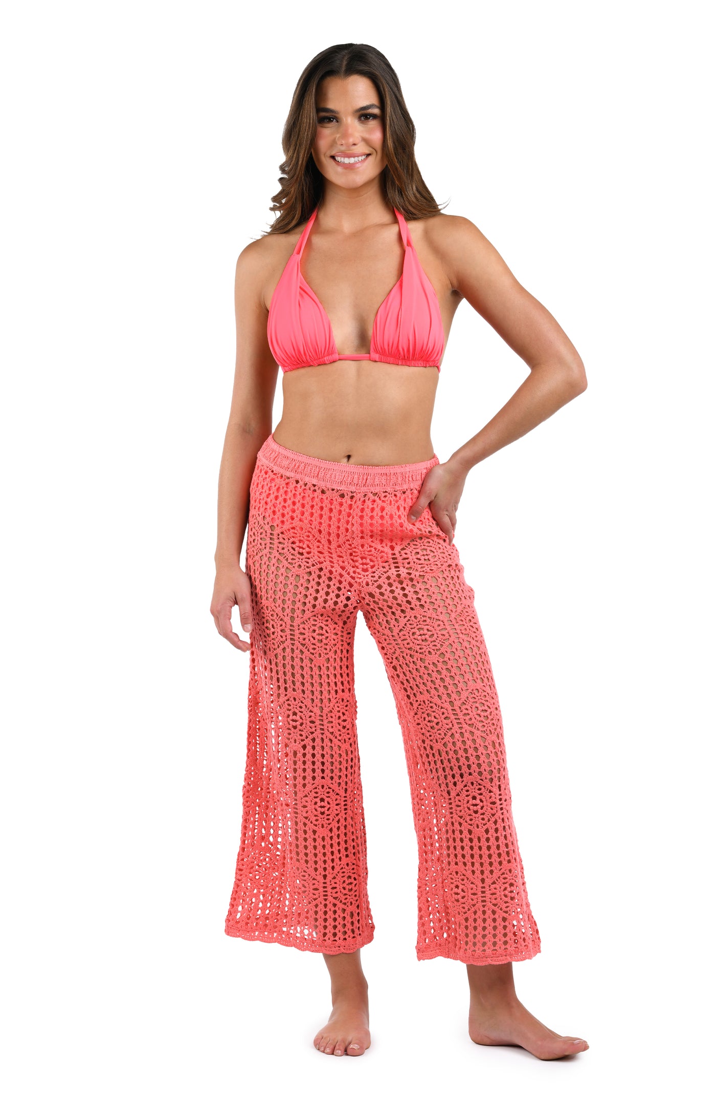 
                  
                    Front image of model wearing the Waverly Covers Cropped Pant (Unlined) in Coral Reef.
                  
                
