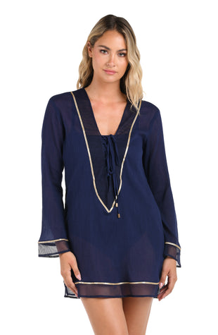 Front image of model wearing the Fields Of Gold Lace Up V-Neck Tunic Cover Up.