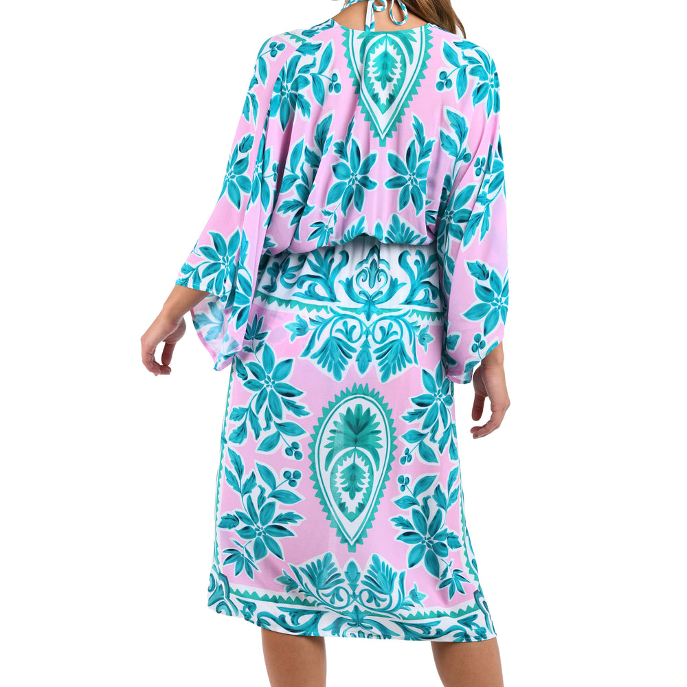 
                  
                    Back image of model wearing the Opulent Palm Kimono in multi color green and pink.
                  
                