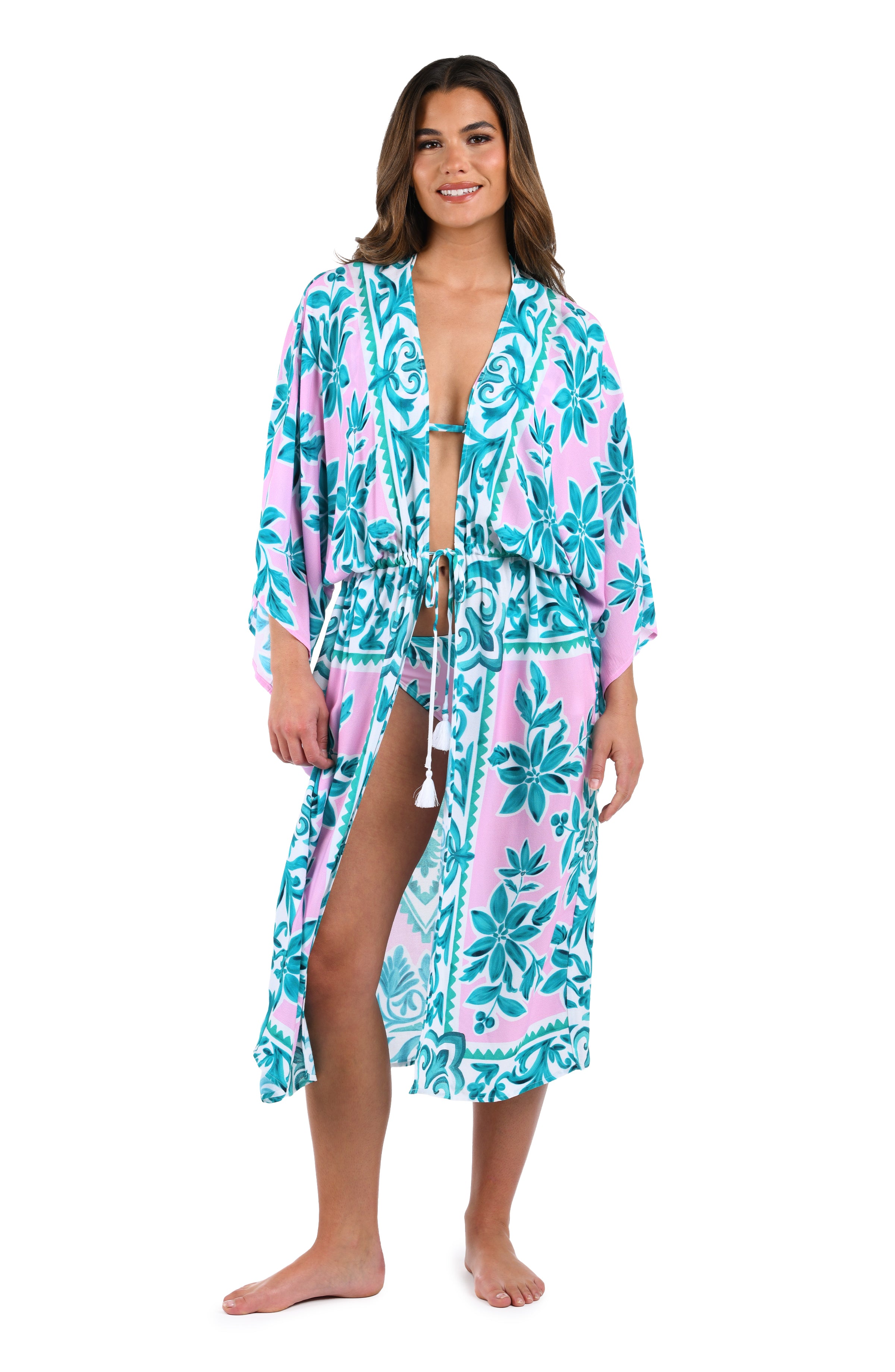 Front image of model wearing the Opulent Palm Kimono in multi color green and pink.