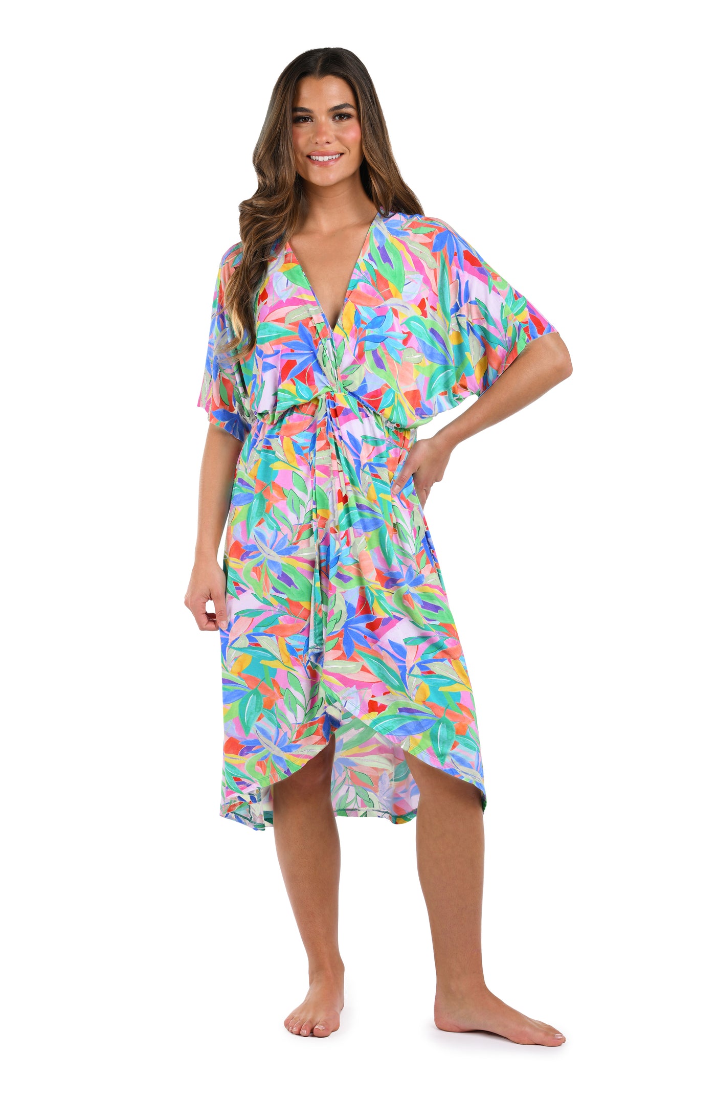 
                  
                    Full body front image of model wearing a multicolored tropical printed midi cover up dress. 
                  
                