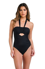 Model is wearing a solid black colored halter one piece swimsuit.