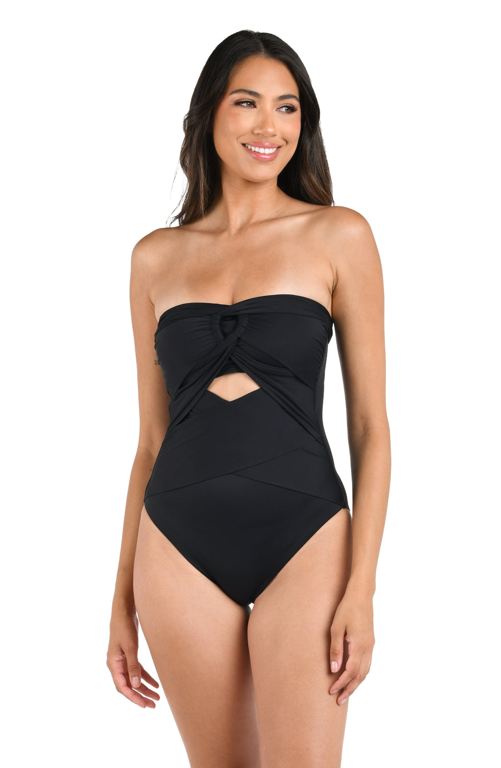 Model is wearing a solid black halter one piece swimsuit.